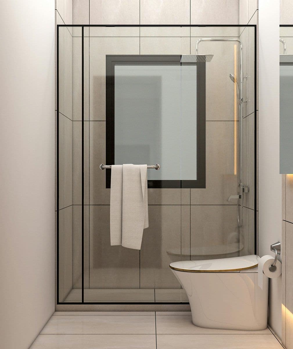 Glass shower enclosure with dark frame