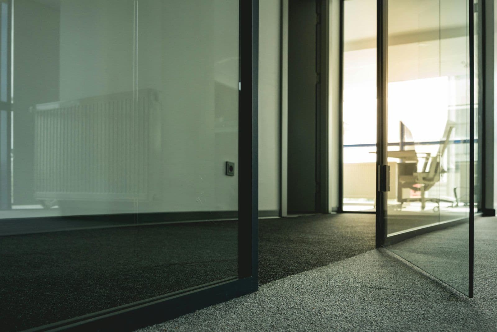 Glass partition with doors in an office space